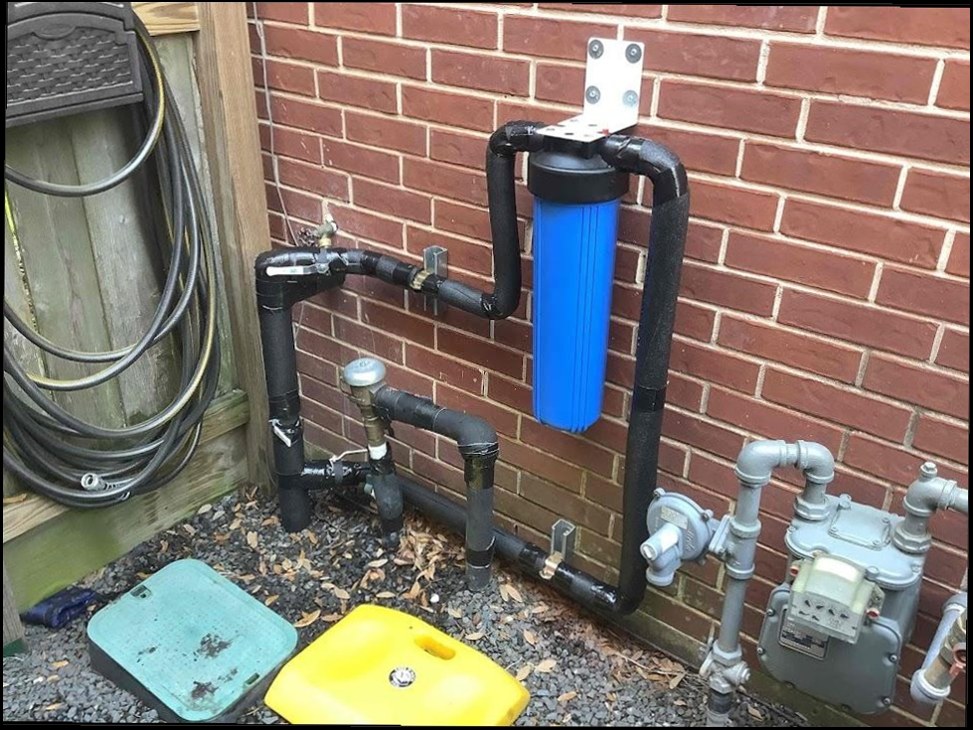 Whole-home water filtration system installed by Sergio and Sons Plumbing